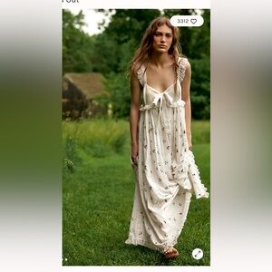 IN SEARCH OF- Starlight babydoll mid dress in a size medium